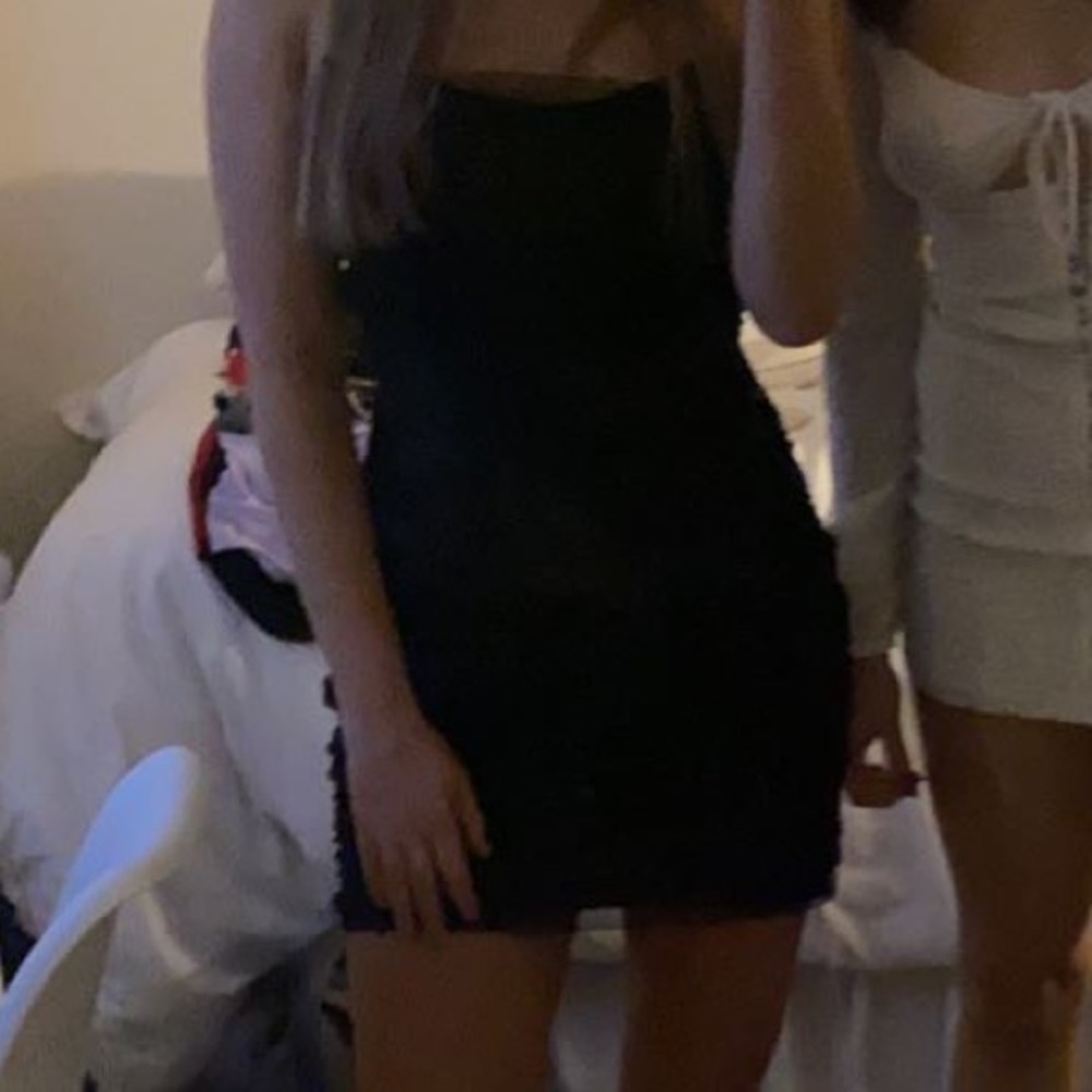 Black toole and corset dress